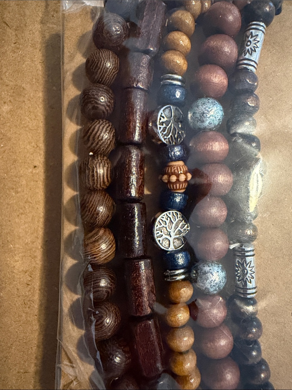 Stacked Wooden Bead Bracelets in Brown & Blue Tones